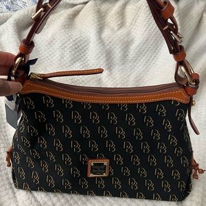 New with tags Black Dooney and Bourke satchel.